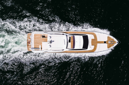 Overhead view of the yacht underway showing the bow, flybridge, and aft decks